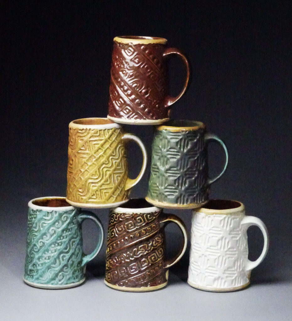 Vince Pitelka, Group of Mugs, 2019, slab-built white stoneware, soda-fired to cone-7