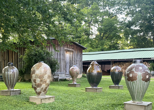 Large Pots on lawn at Hewit Pottery